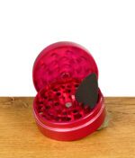 Blazy Susan Grinder in Hot Pink, geöffnet und mit Pollensammler
