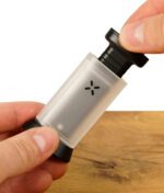 Pax Puck Presse in der Hand