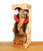RAW Doobie Dancer in seiner Verpackung auf einem Holztisch vor weißem Hintergrund