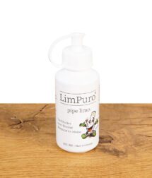 Limpuro Pipe Limo Teerblocker auf Holztisch stehend mit geöffneter Sicherungskappe