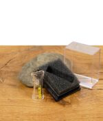 EHLE. Glasfilter neben geöffneter Box mit schwarzem Schaumstoffinlay