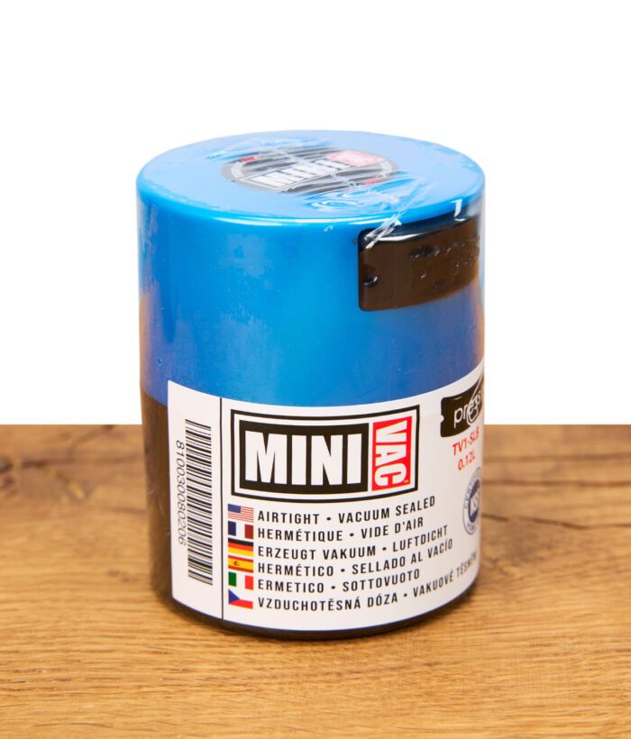 Vorderseite eines blauen Tightvac MINIVAC Vakuum-Behälters mit Produktinformationen und Vakuumhinweis.