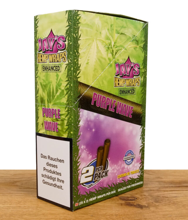 Juicy Hemp Wraps Purple Wave Packung auf einem Holzbrett