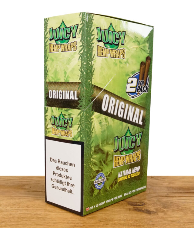 Juicy Hemp Wraps Original 25er Pack auf einem Holzbrett