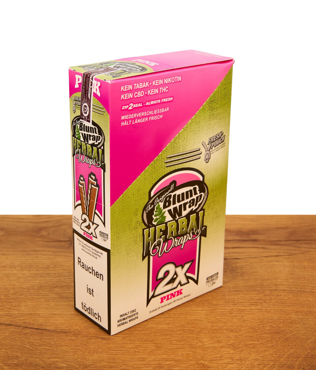 blunt-wrap-herbal-wraps-25er-pack-pink-jpg Pinke Display-Box Blunt Wrap Herbal Wraps 25er Pack Pink auf Holztisch. Aromatisierte, tabakfreie Wraps.
