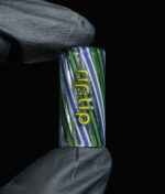 RipTip Greens Keeper Glasfilter Detailansicht – blau-grünes Twisted-Glas mit gelbem rip:tip-Logo vor schwarzem Hintergrund