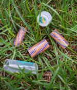 RipTip Sunday Driver Glasfilter Outdoor-Lifestyle – orange-violette Filter im Gras mit Schutztubus, sonnige Stimmung
