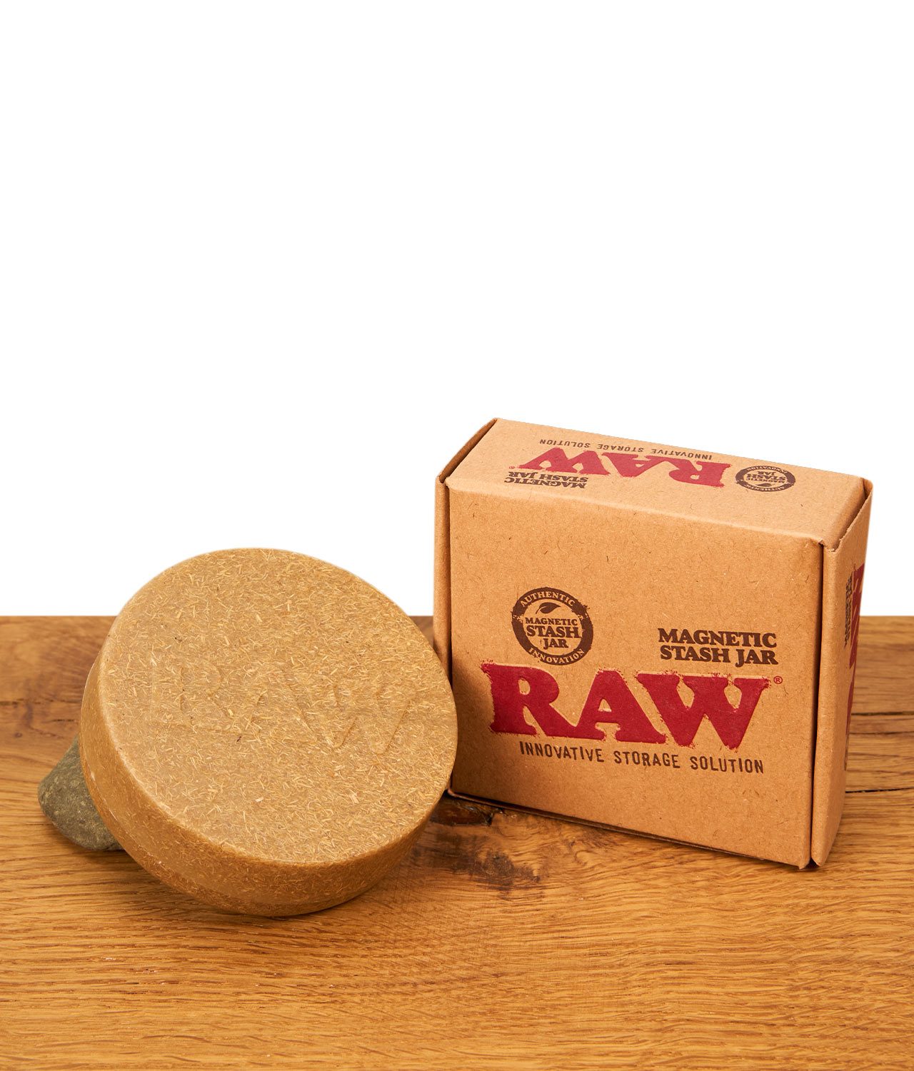 raw-magnetic-stash-jar-jpg RAW Magnetic Stash Jar Hanfkunststoff-Dose geschlossen neben der Originalverpackung auf Holz.