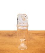 Dr. Dabber Switch 2 Ersatzglas mit integriertem Perkolator-Schaft aus Borosilikatglas auf Holzgrund.